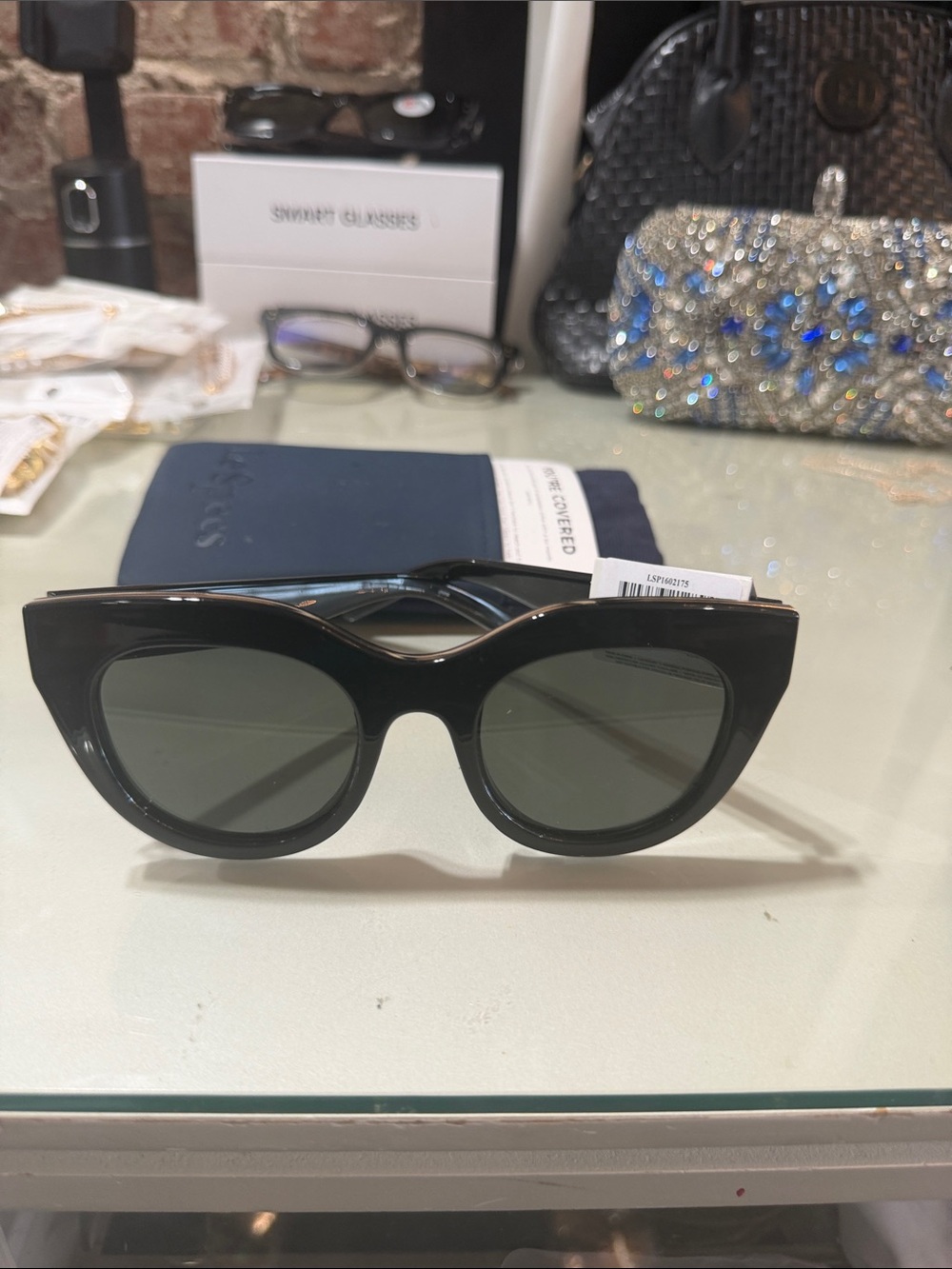 Le Specs Black Cat-Eye Sunglasses with Dark Green Lenses